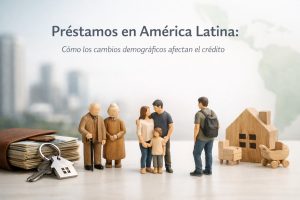 Imagen conceptual sobre préstamos y demografía en América Latina, con el título “Préstamos en América Latina: cómo los cambios demográficos afectan el crédito”. Sobre una superficie clara aparecen figuras de madera que representan distintas etapas de la vida: una pareja de adultos mayores, una familia con padres e hijo pequeño y un joven con mochila, simbolizando generaciones y cambios poblacionales. A la izquierda se observa una cartera con billetes y un llavero con forma de casa, mientras que a la derecha hay una casa de madera y un pequeño cochecito. El fondo urbano desenfocado sugiere el contexto económico y social de la región, relacionando evolución demográfica y acceso al crédito.